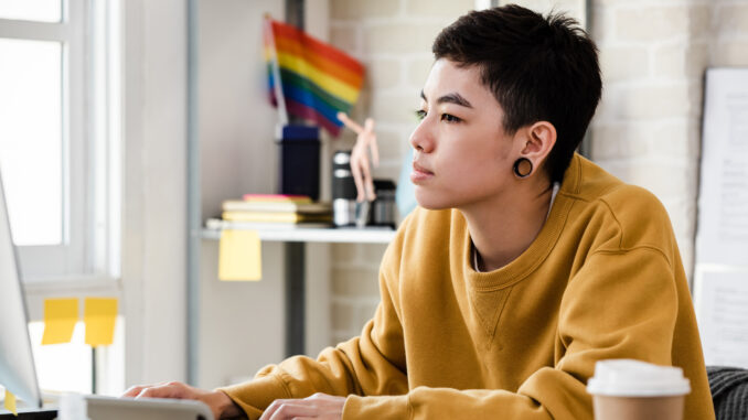 A woman works on a computer