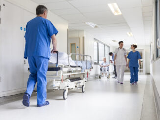Health care workers in a corridor
