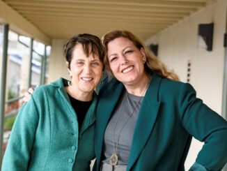 Two women at a school campus