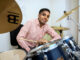Portrait of Rahul Chintalapudi at home with his drums.