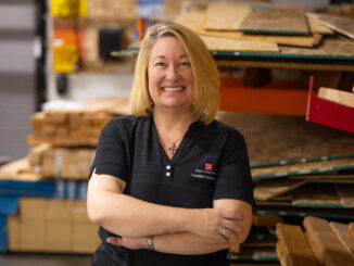 Becky Barabe in a workshop smiling for the camera