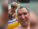 A selfie of Dan McCullough and his mother Nancy in a swimming pool