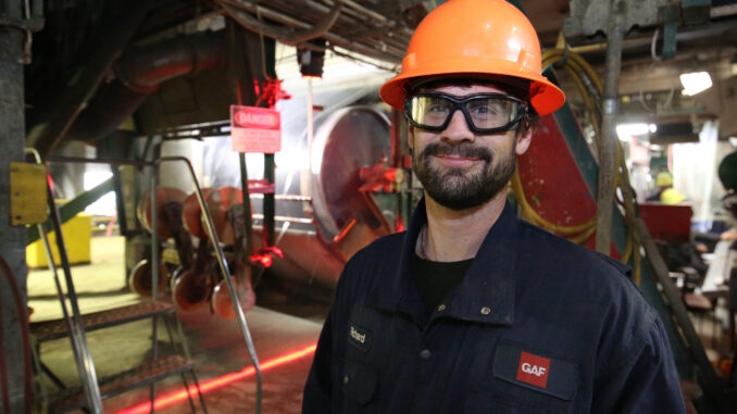 Richard Van Horne shown on the job as an Electrical Instrumentation Supervisor at the GAF shingle manufacturing plant