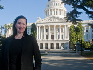 Darcy Totten in front of the Capitol building in Sacramento