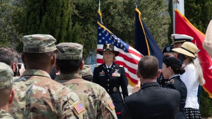 CCSWG_S5_Erica Courtney_03 Erica Courtney in dress uniform speaking to uniformed service members