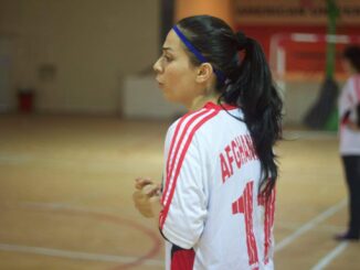Kawser Amine in uniform on a court