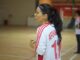 Kawser Amine in uniform on a court